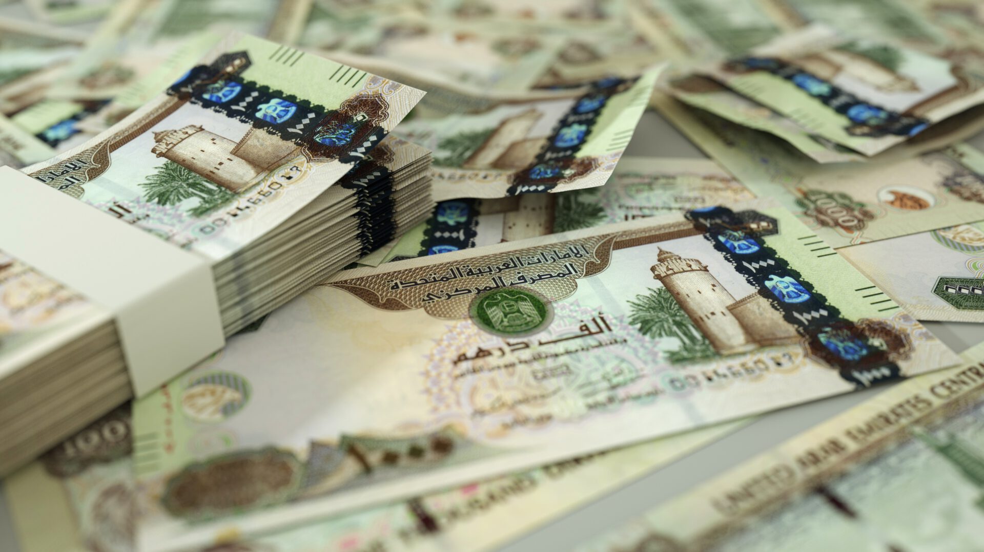 Money in Dubai - Stack of dirham banknotes