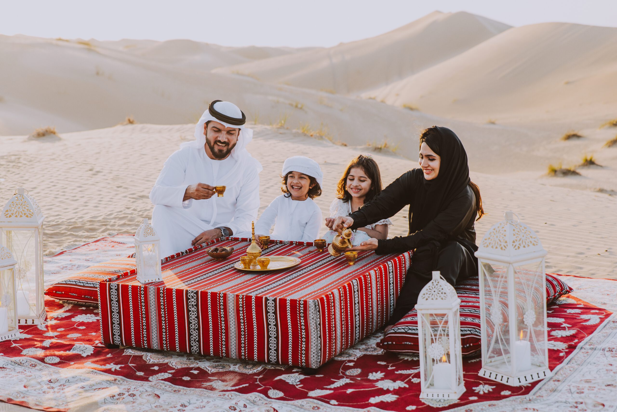 Dubai Customs and Traditions - UAE family having a traditional meal