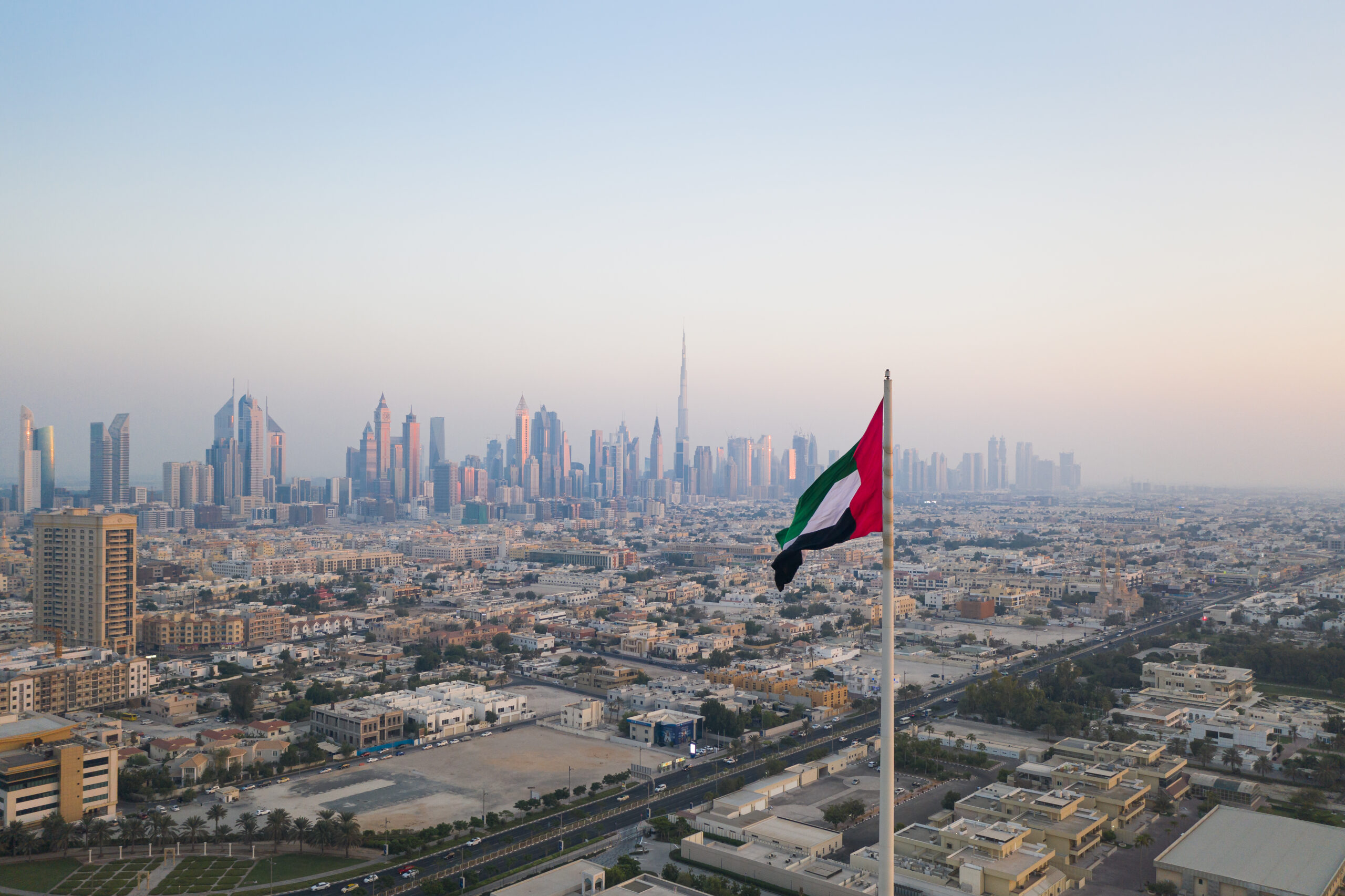 ОАЭ города. Засев облаков Дубай. UAE Nationality. Flag UAE Dubai.